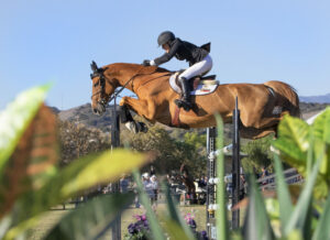 Joie Gatlin jumping horse.